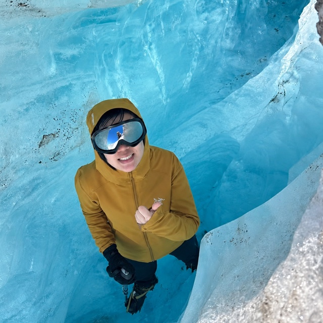 Sirou Zhu in a blue ice cave